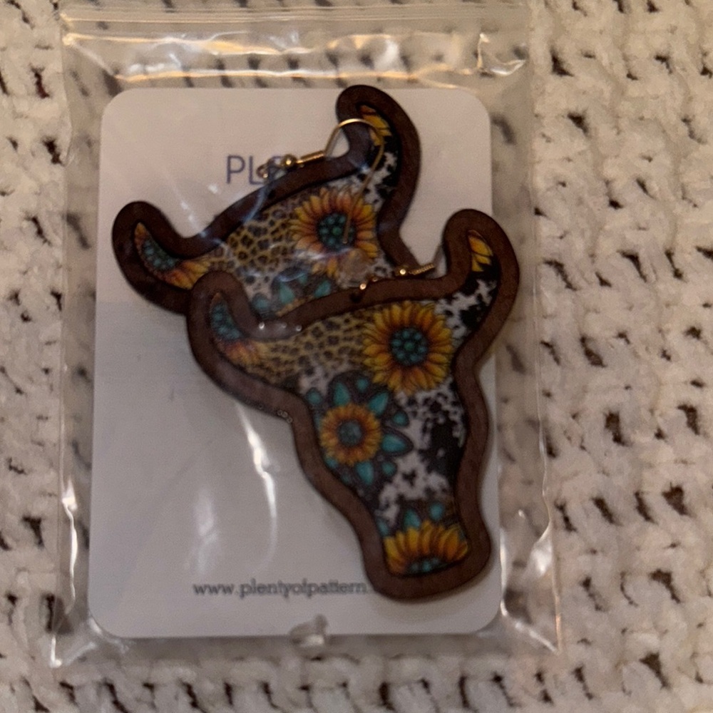 Colorful Bull Earrings with Floral Design